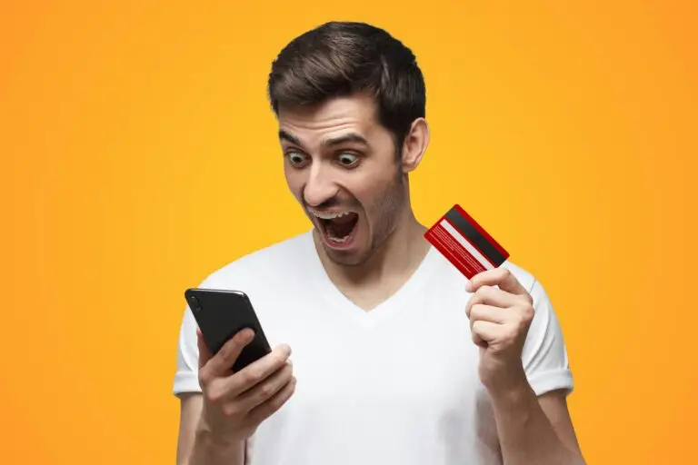 angry-man-holding-credit-card-and-phone-shouting-having-problem-with-bank-account-or-money